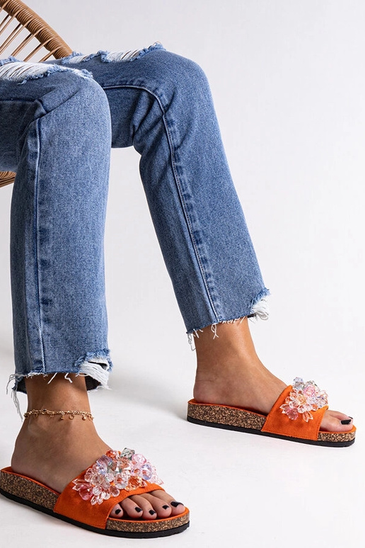 Orange flip-flops dekoreret med... Orange flip-flops dekoreret med...