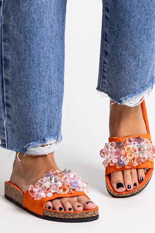 Orange flip-flops dekoreret med... Orange flip-flops dekoreret med...