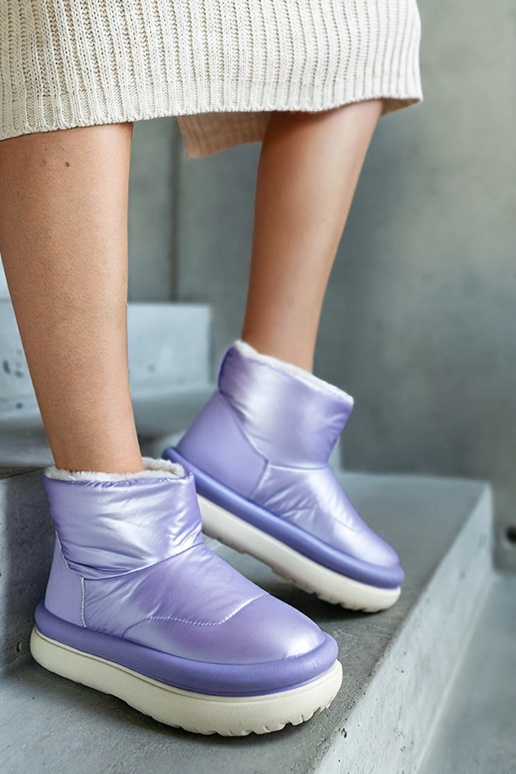 Lilla varme snestøvler på Cores...