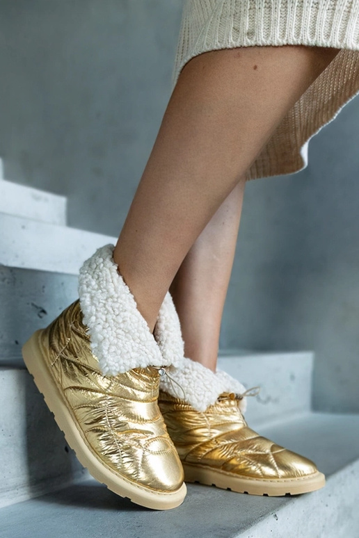 Gouden warme snowboots met koord... Gouden warme snowboots met koord...