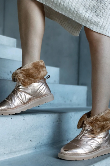 Gouden warme snowboots met...