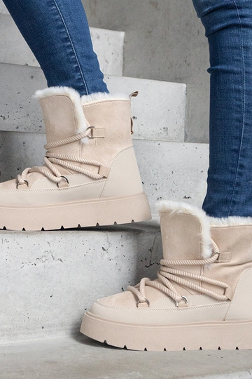 Beige snowboots met...