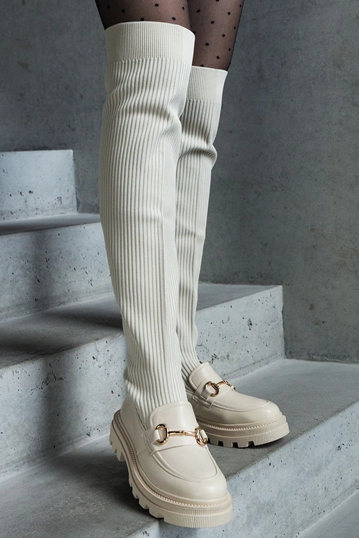 Lyse beige støvler med elastisk... Lyse beige støvler med elastisk...