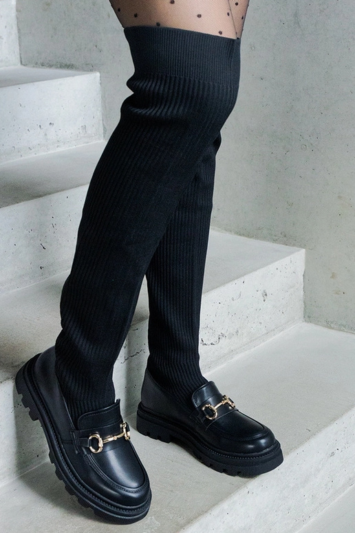 Zwarte laarzen met elastische schacht... Zwarte laarzen met elastische schacht...