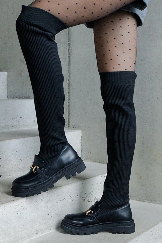 Zwarte laarzen met elastische schacht... Zwarte laarzen met elastische schacht...