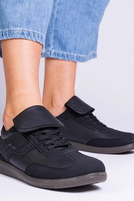 Zwarte lage dames sportschoenen met...