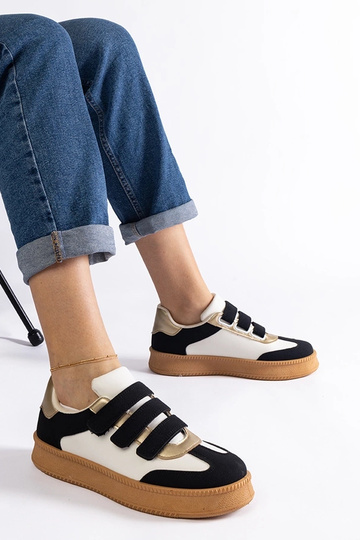 Sorte damesneakers med...