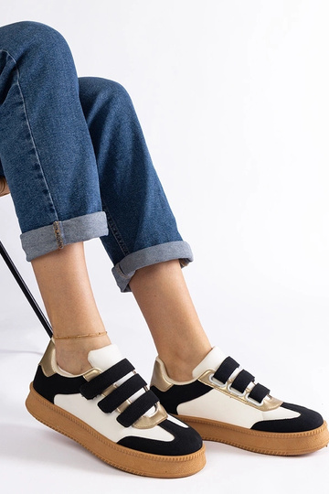 Sorte damesneakers med... 2