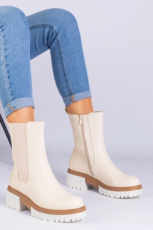 Beige ankelstøvler lavet af Tantala...