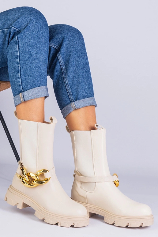 Beige enkellaarsjes tot de enkel...