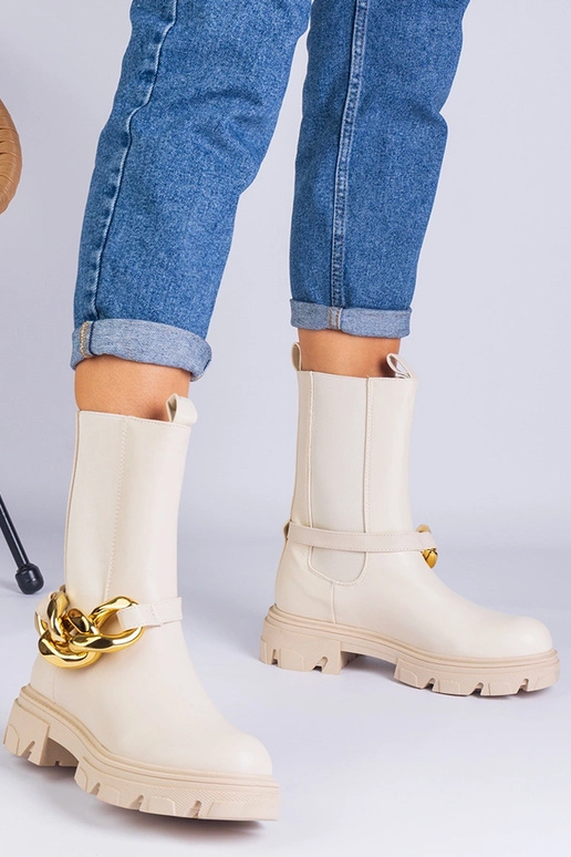 Beige enkellaarsjes tot de enkel...