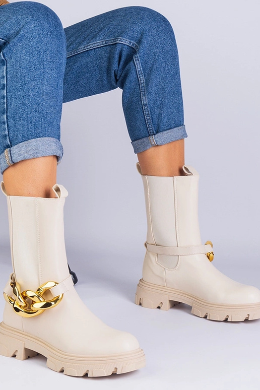 Beige enkellaarsjes tot de enkel...