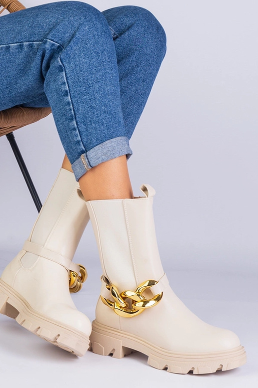 Beige enkellaarsjes tot de enkel...