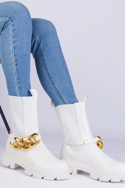 Hvide ankelstøvler dekoreret med en...