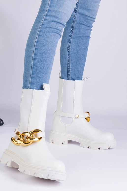 Hvide ankelstøvler dekoreret med en...