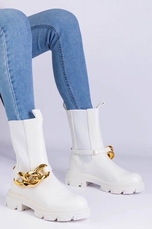 Hvide ankelstøvler dekoreret med en...