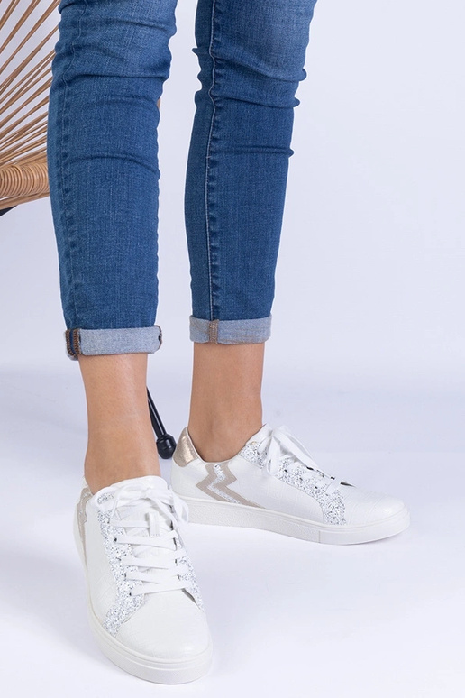 Hvide damesneakers med prægning og... Hvide damesneakers med prægning og...