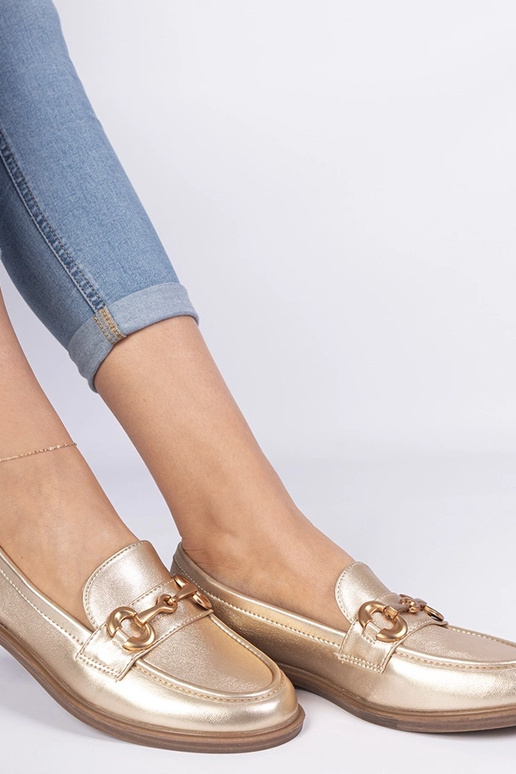 Gouden dames mocassins met gouden... Gouden dames mocassins met gouden...