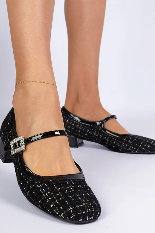 Zwarte pumps met stoffen afwerking en...