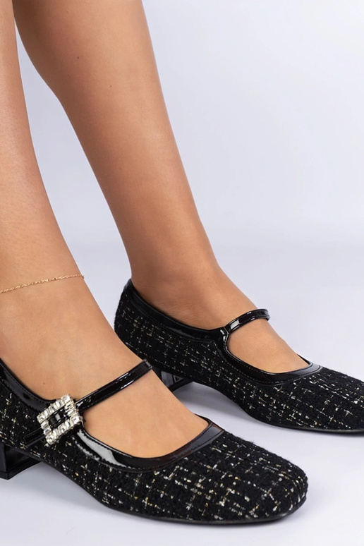 Zwarte pumps met stoffen afwerking en...