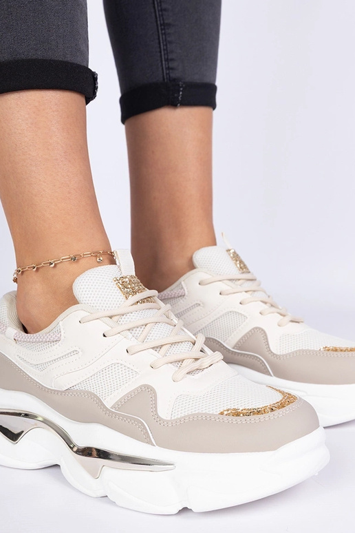 Beige dames sneakers versierd met... Beige dames sneakers versierd met...