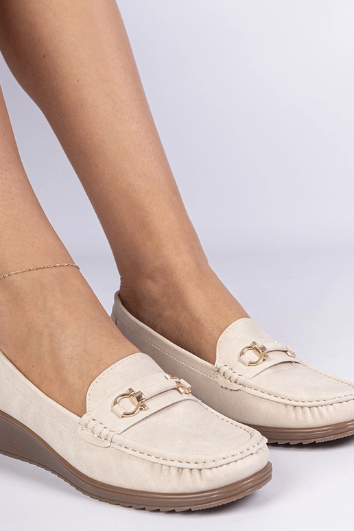 Crème dames mocassins op een sleehak... Crème dames mocassins op een sleehak...