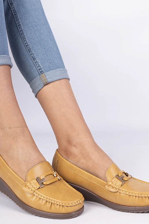 Gele dames mocassins op een sleehak... Gele dames mocassins op een sleehak...