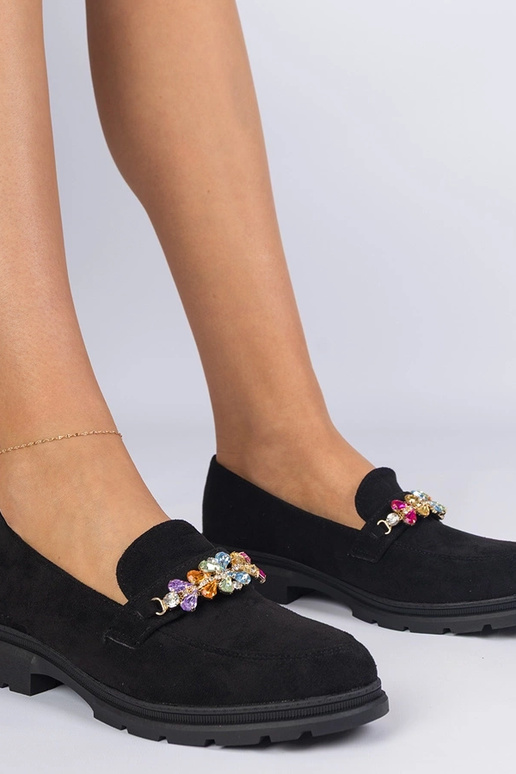 Zwarte damesschoenen versierd met...