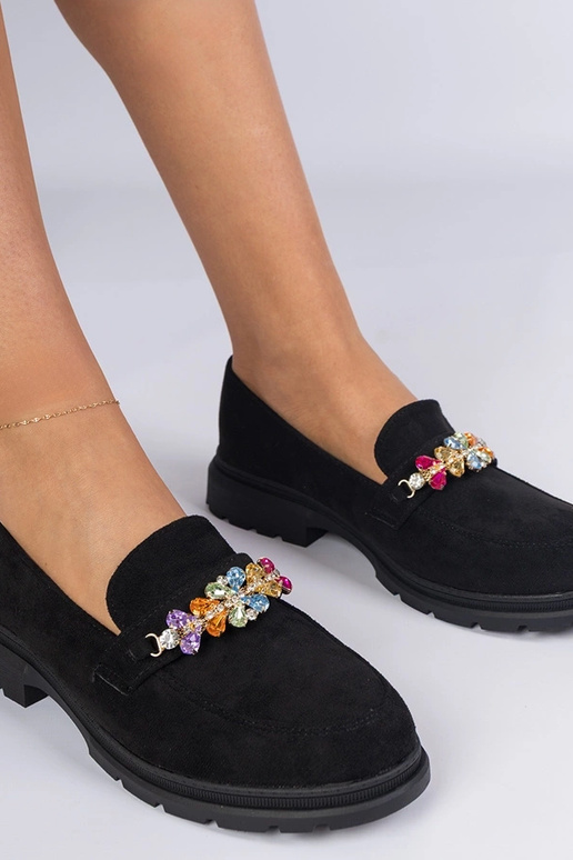 Zwarte damesschoenen versierd met...