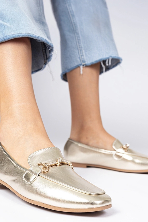 Gouden damesschoenen met versiering... Gouden damesschoenen met versiering...