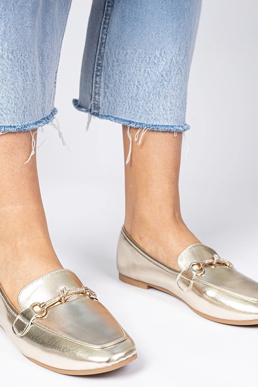 Gouden damesschoenen met versiering... Gouden damesschoenen met versiering...