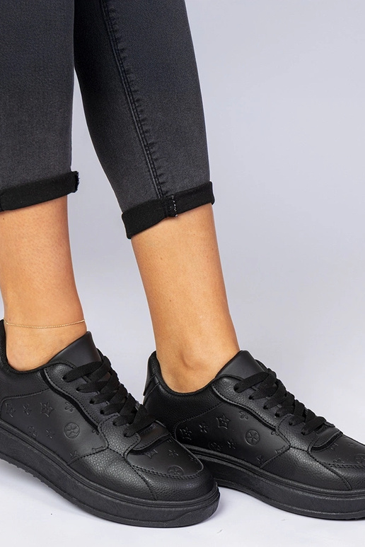 Zwarte sportschoenen van kunstleer...