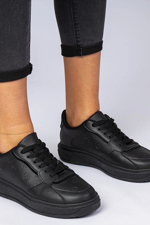 Zwarte sportschoenen van kunstleer...