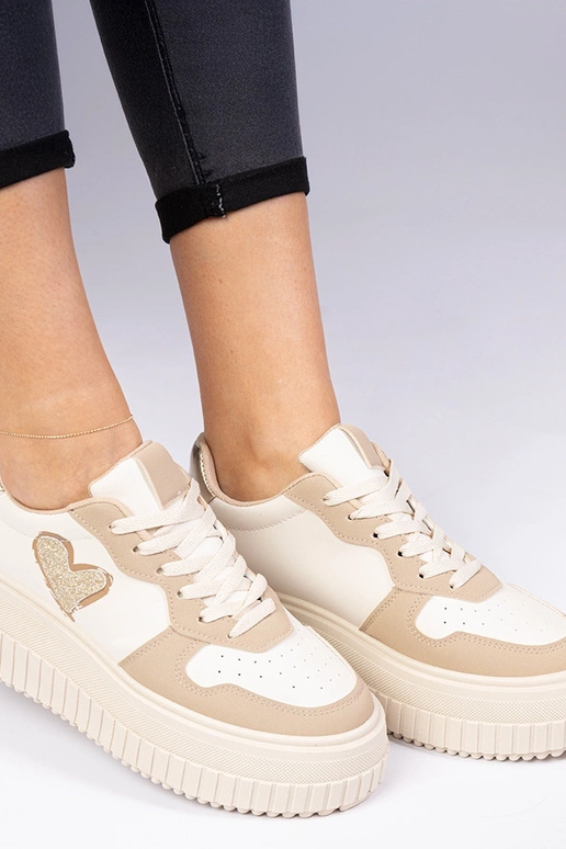 Bruine dames sneakers met een... Bruine dames sneakers met een...