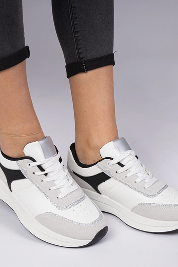 Witte dames sneakers met...
