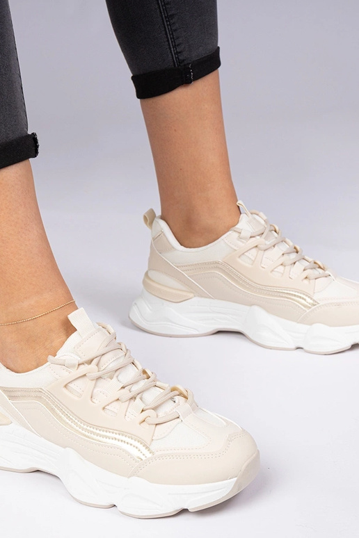 Beige dames sneakers met gouden...