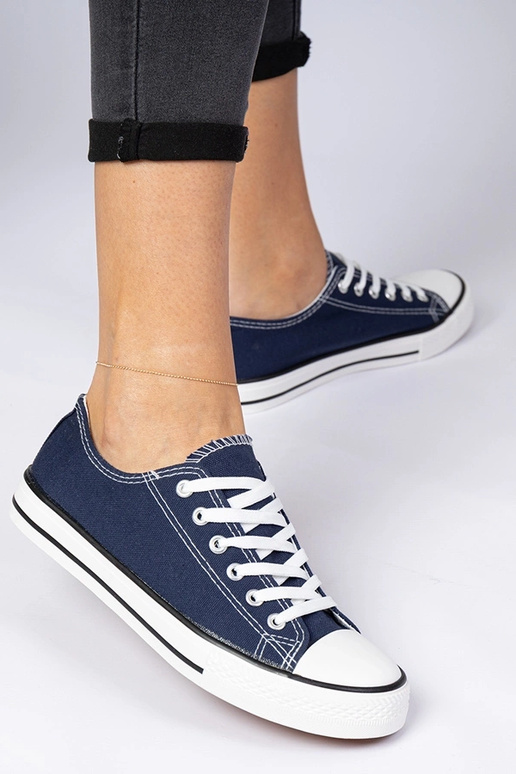 Marineblauwe klassieke dames sneakers... Marineblauwe klassieke dames sneakers...
