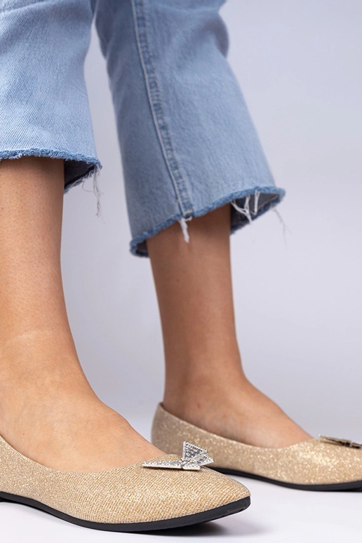 Gouden damesbalerina's met glitter en... Gouden damesbalerina's met glitter en...