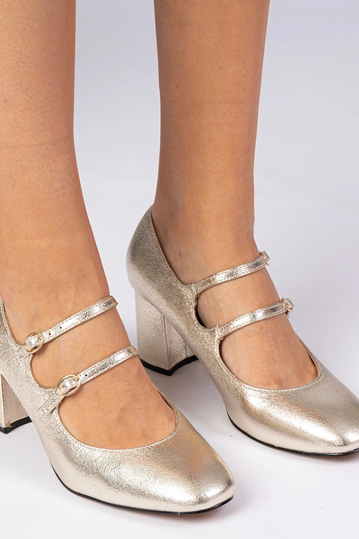 Gouden dames pumps op blokhak met... Gouden dames pumps op blokhak met...