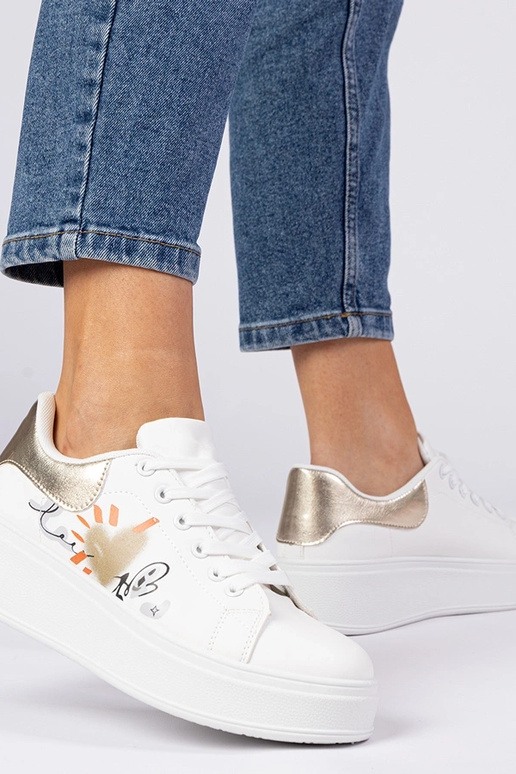 Wit-gouden sportieve sneakers met... Wit-gouden sportieve sneakers met...