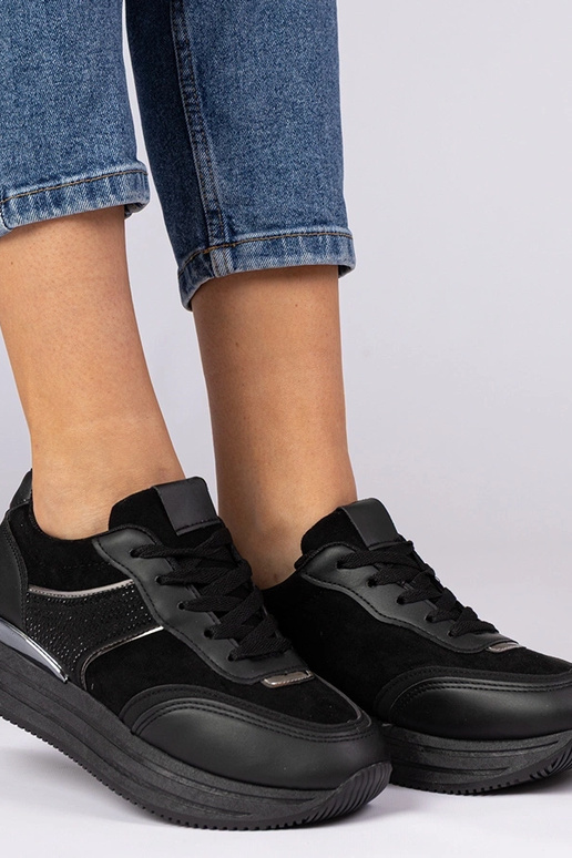 Zwarte dames sneakers op platform met...