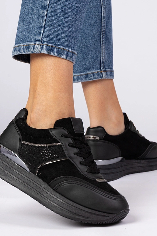 Zwarte dames sneakers op platform met...