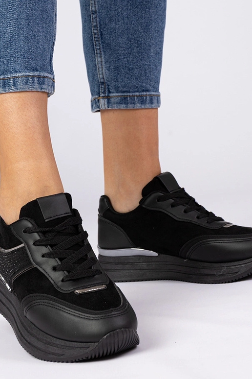 Zwarte dames sneakers op platform met...