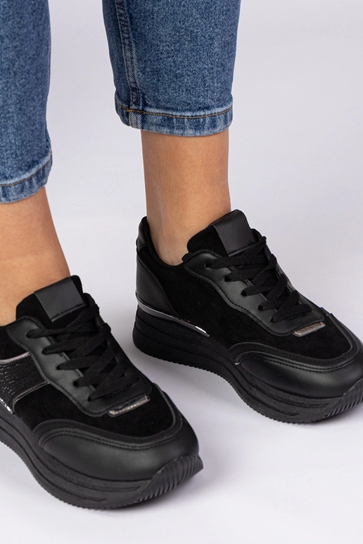 Zwarte dames sneakers op platform met...