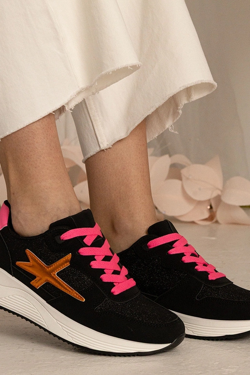 Zwarte sportieve dames sneakers met... Zwarte sportieve dames sneakers met...