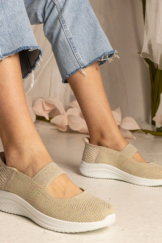 Beige sneakers met geperforeerde zool... Beige sneakers met geperforeerde zool...