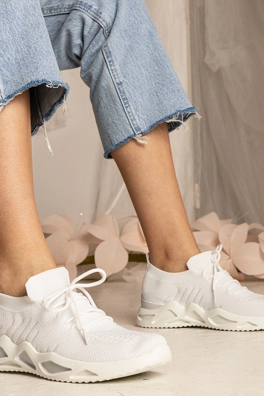 Witte dames sneakers met sok-achtige... Witte dames sneakers met sok-achtige...