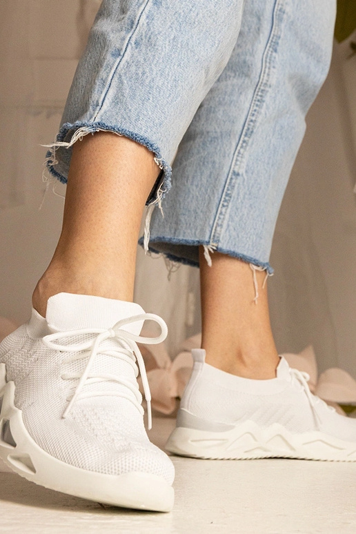 Witte dames sneakers met sok-achtige... Witte dames sneakers met sok-achtige...