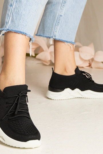Zwarte sneakers met... 2