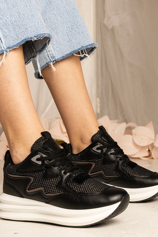 Zwarte sneakers met holografisch... Zwarte sneakers met holografisch...